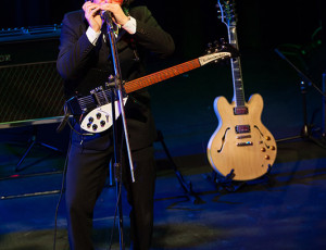 John playing harmonica on 'Love Me Do'.